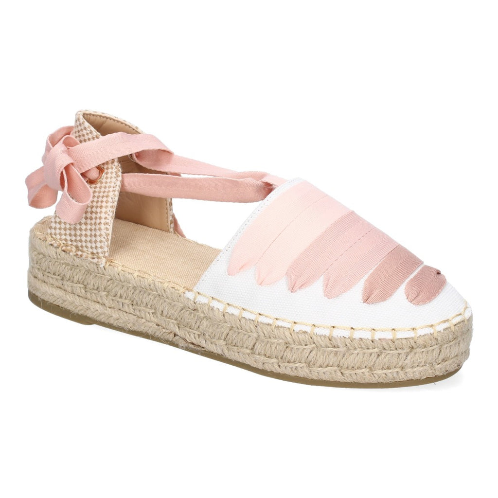 Alpargata plana rosa con cierre de cintas y adorno frontal